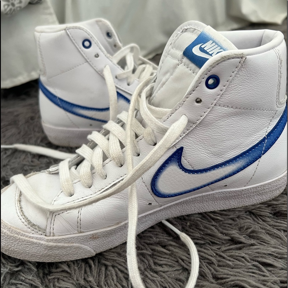 Blue and white Nike blazers